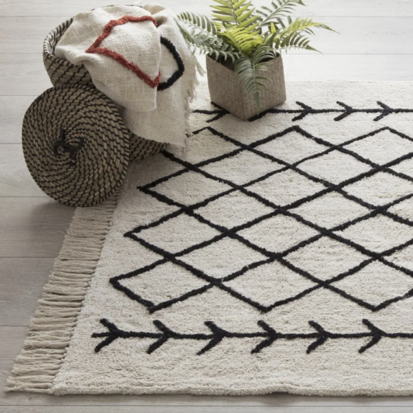 Tapis tufté beige et noir